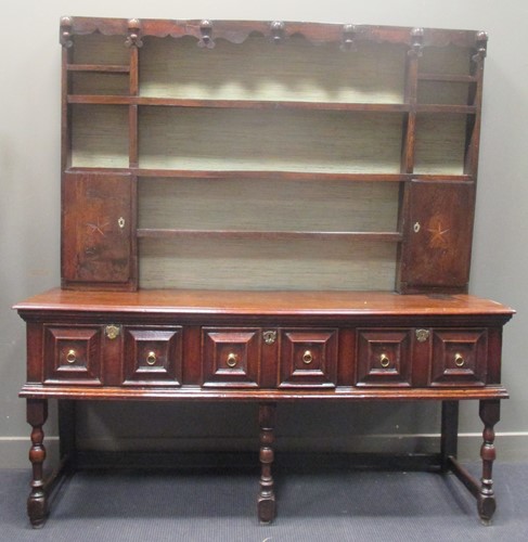 Lot 366 - A 17th century and later oak dresser, the...