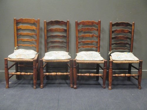 Lot 498 - A set of four 19th century ladder back dining...