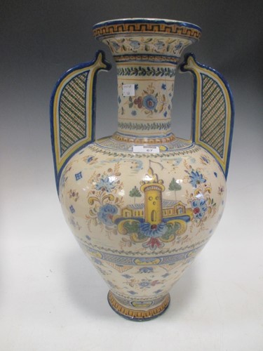 Lot 67 - A Continental faïence twin handled ewer 50cm high