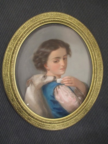 Lot 292 - French School, Young girl with a dog, pastel...