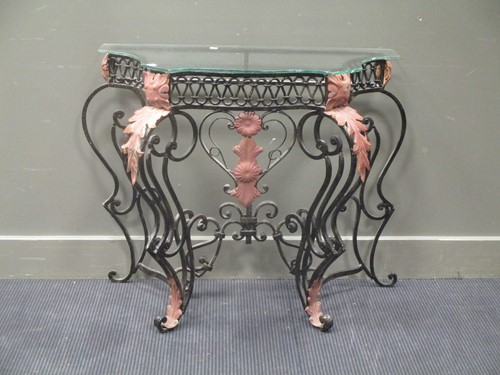 Lot 431 - A Wrought iron console with glass top, 76 x...