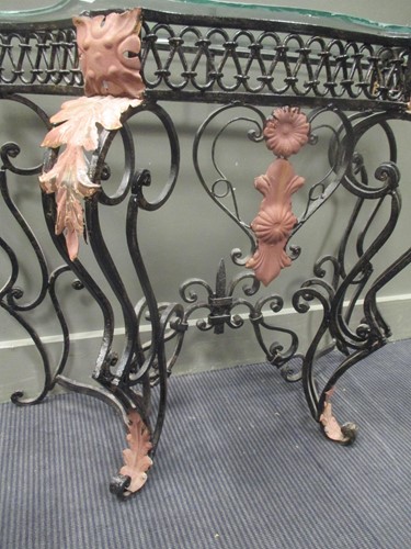 Lot 431 - A Wrought iron console with glass top, 76 x...