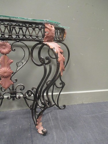 Lot 431 - A Wrought iron console with glass top, 76 x...