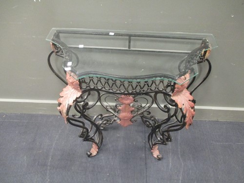 Lot 431 - A Wrought iron console with glass top, 76 x...