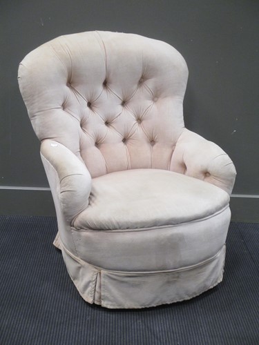 Lot 384 - A late 19th century buttoned back chair with...