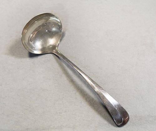 Lot 409 - A 20th century silver soup ladle