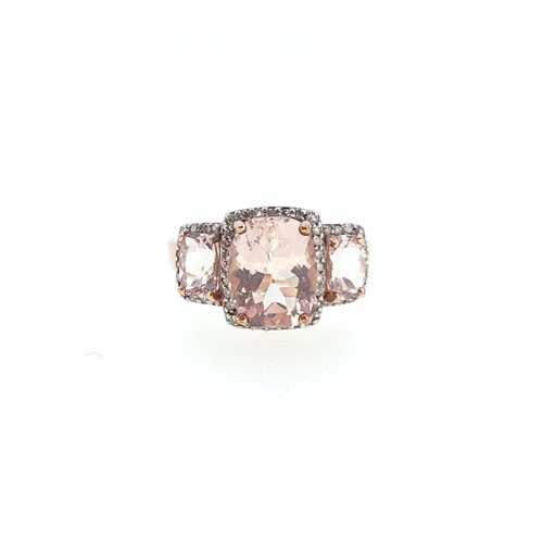 Lot 23 - Two gold dress rings, one set with morganite, the other with peridot
