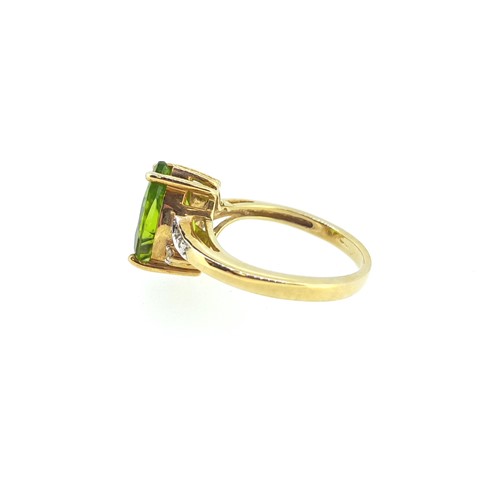 Lot 23 - Two gold dress rings, one set with morganite, the other with peridot
