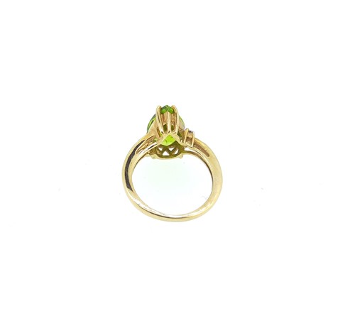 Lot 23 - Two gold dress rings, one set with morganite, the other with peridot