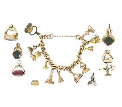 Lot 79 - A late 19th Century charm bracelet