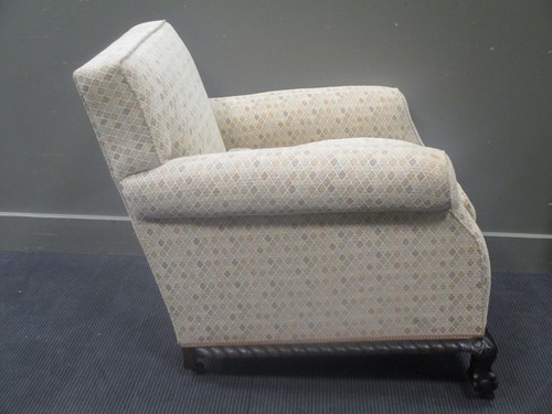 Lot 537 - Circa 1900 A Howard style armchair on ball in...