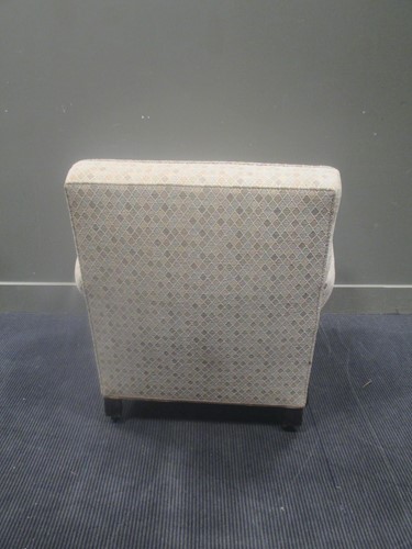 Lot 537 - Circa 1900 A Howard style armchair on ball in...