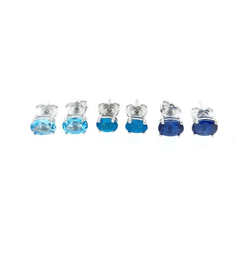 Lot 57 - A set of three 'blue' gem set ear studs