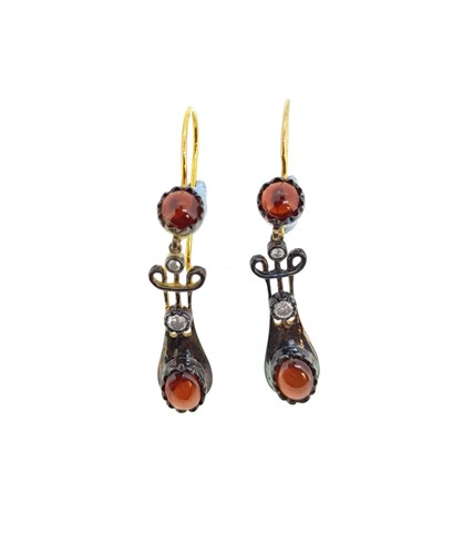 Lot 68 - A pair of garnet ear pendants in the Edwardian style