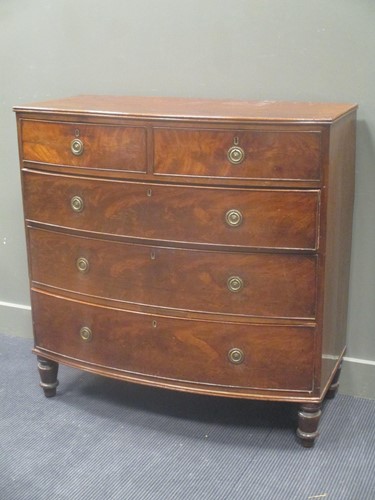 Lot 418 - A 19th century mahogany bow front chest of...