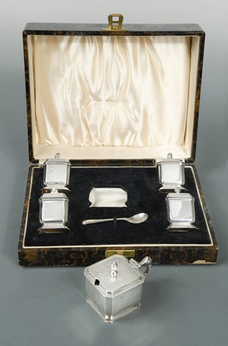 Lot 396 - A George V silver Art Deco 5 piece condiment set in the original case