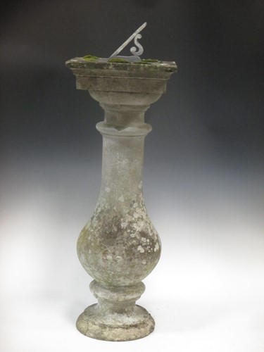 Lot 566 - A baluster shape composition stone pedestal...