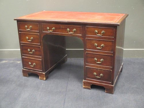 Lot 503 - A George III style mahogany twin pedestal desk,...