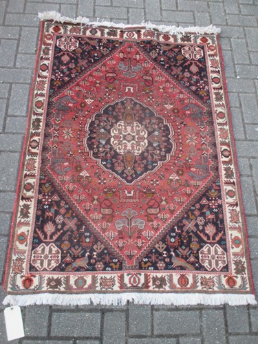 Lot 585 - A Quashqai rug 155 x 104cm, a geometric rug...