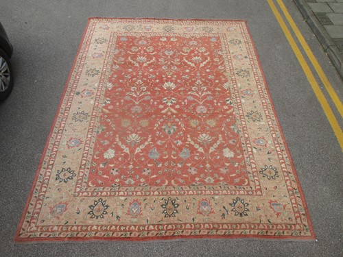 Lot 601 - A modern 'Ziegler' carpet, with terracotta...