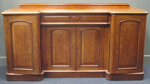 Lot 427 - A Victorian mahogany inverted breakfront...
