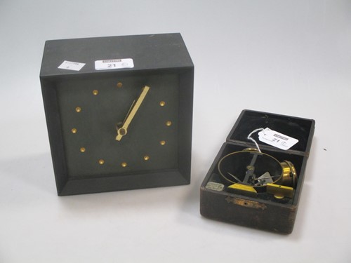 Lot 21 - A Welsh slate cased batery clock and a German...