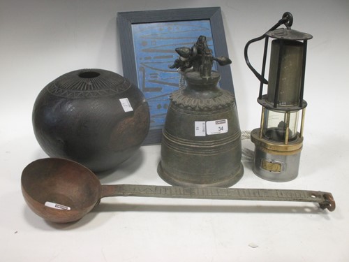 Lot 34 - A bronze temple style bell, 23cm high, an...