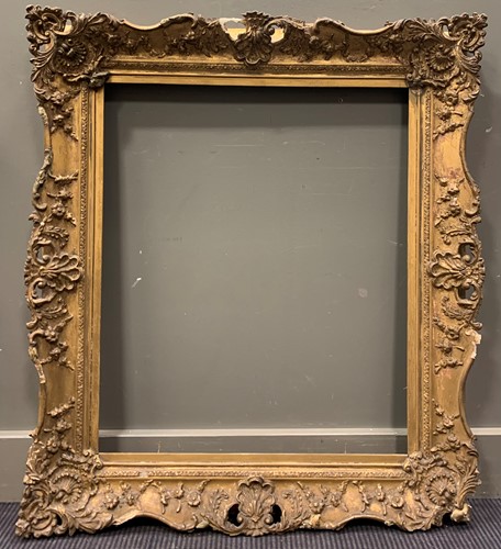 Lot 334 - A pair of 19th century swept gilt frames. 75 x...