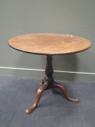 Lot 458 - A George III mahogany tripod table with...