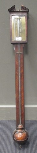 Lot 583 - An early 19th century mahogany stick barometer...