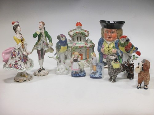 Lot 92 - A pair of 20th century Meissen parrots (small...