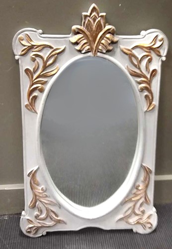 Lot 515 - A modern carved wood grey and gilt mirror