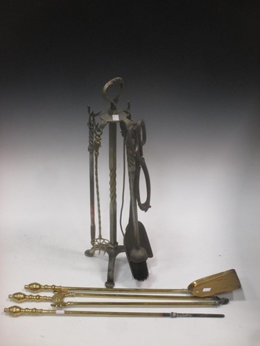 Lot 423 - A wrought iron companion set; together with...