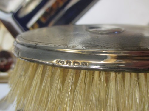 Lot 199 - An incomplete silver manicure set; together...