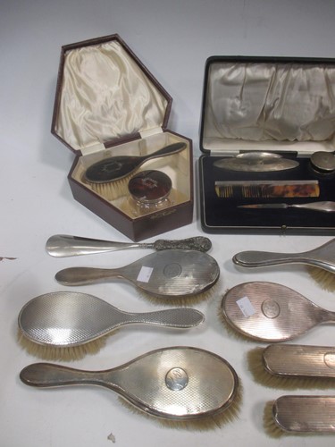 Lot 199 - An incomplete silver manicure set; together...