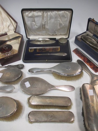 Lot 199 - An incomplete silver manicure set; together...