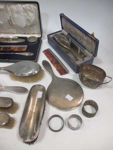 Lot 199 - An incomplete silver manicure set; together...