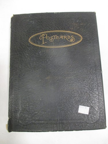 Lot 158 - A postcard album, mainly with typical scenic...