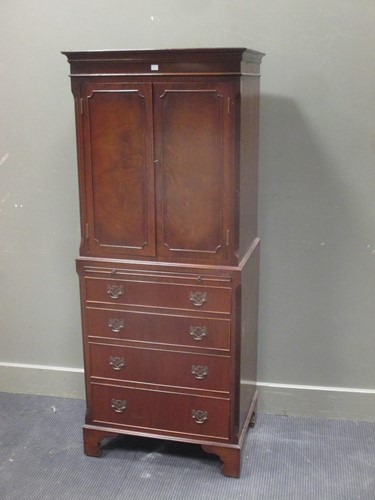 Lot 385 - A mahogany reproduction cabinet on chest, 155...