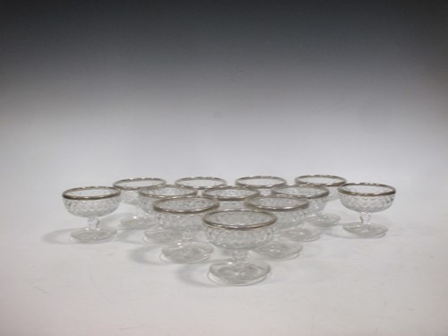 Lot 203 - A set of 12 silver rimmed Sundae glasses...