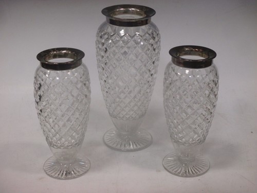 Lot 195 - Three matching silver mounted cut glass vases