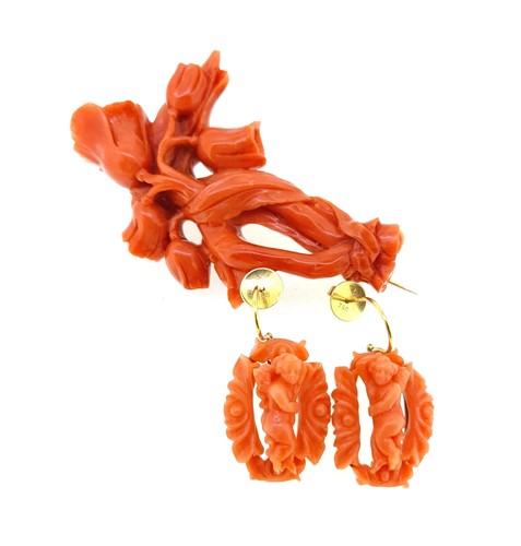 Lot 17 - A 19th century carved coral brooch and ear pendants en suite