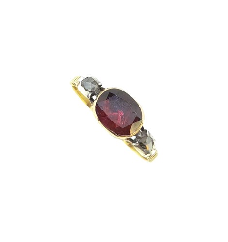 Lot 66 - A Georgian garnet and diamond three stone ring