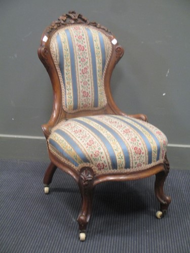 Lot 356 - A small carved oak frame Victorian nursing chair