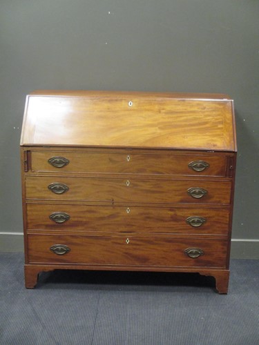 Lot 495 - A late Georgian mahogany bureau of Scottish...