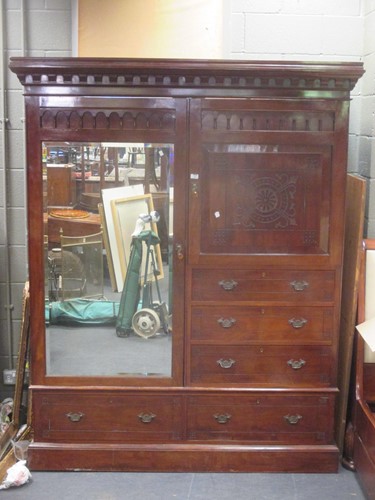 Lot 398 - A late Victorian mahogany combination wardrobe...