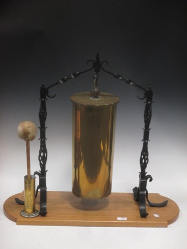 Lot 131 - A dinner gong, the brass bell made out of a...