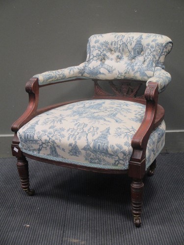 Lot 438 - An Edwardian tub arm chair