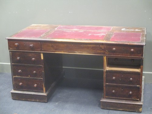 Lot 527 - A twin pedestal desk with adjustable top (A/F)...