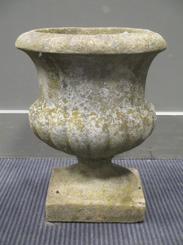 Lot 569 - A composite garden urn, of classical form with...